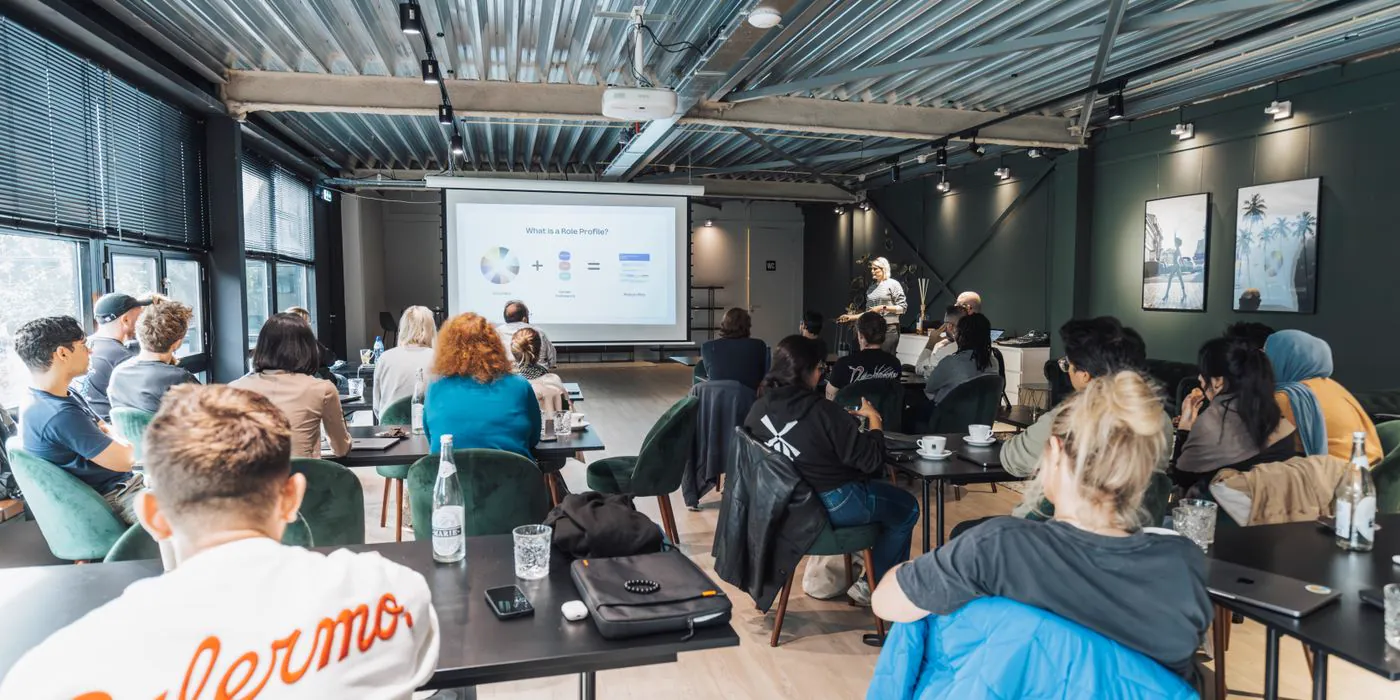 A diverse group attending a technical workshop session